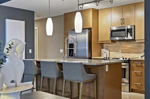 202-1320 1 Street Se, Calgary, AB - Indoor Photo Showing Kitchen With Stainless Steel Kitchen With Upgraded Kitchen