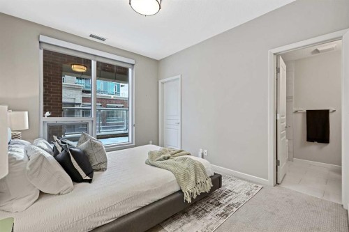 202-1320 1 Street Se, Calgary, AB - Indoor Photo Showing Bedroom