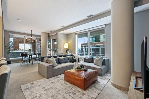 202-1320 1 Street Se, Calgary, AB - Indoor Photo Showing Living Room