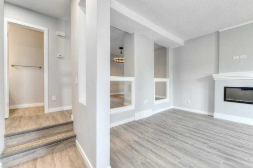 802-5340 17 Avenue Sw, Calgary, AB - Indoor With Fireplace