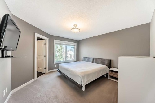 136 Aspenmere Close, Chestermere, AB - Indoor Photo Showing Bedroom