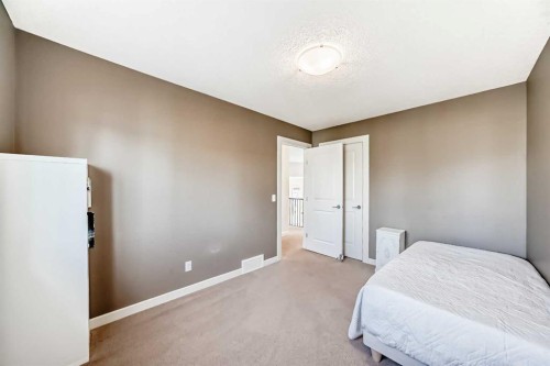 136 Aspenmere Close, Chestermere, AB - Indoor Photo Showing Bedroom