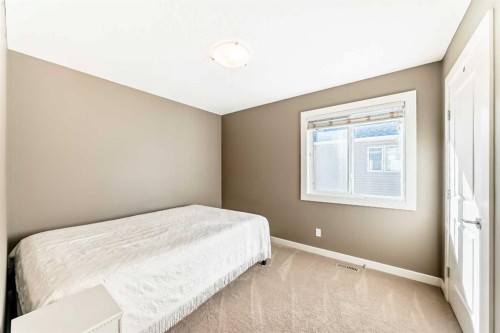 136 Aspenmere Close, Chestermere, AB - Indoor Photo Showing Bedroom