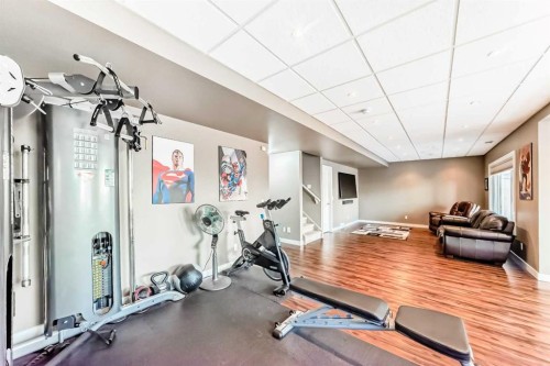 136 Aspenmere Close, Chestermere, AB - Indoor Photo Showing Gym Room
