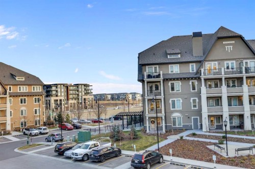 318-20 Mahogany Mews Se, Calgary, AB - Outdoor With Facade