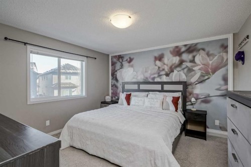 216 Copperpond Green Se, Calgary, AB - Indoor Photo Showing Bedroom
