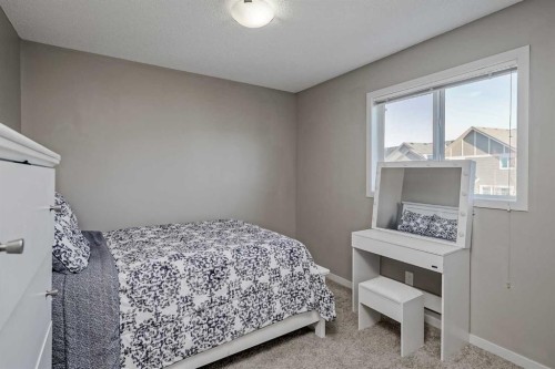 216 Copperpond Green Se, Calgary, AB - Indoor Photo Showing Bedroom