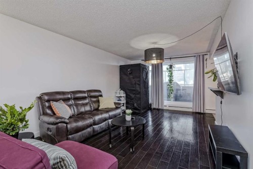 105-4455C Greenview Drive Ne, Calgary, AB - Indoor Photo Showing Living Room