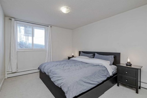 105-4455C Greenview Drive Ne, Calgary, AB - Indoor Photo Showing Bedroom