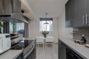 105-4455C Greenview Drive Ne, Calgary, AB  - Indoor Photo Showing Kitchen With Upgraded Kitchen 