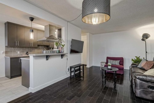 105-4455C Greenview Drive Ne, Calgary, AB - Indoor Photo Showing Kitchen With Upgraded Kitchen