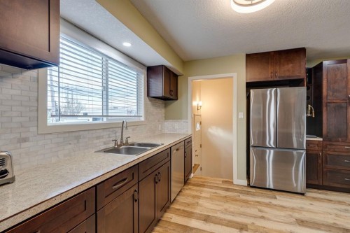 2015 Milne Drive Ne, Calgary, AB - Indoor Photo Showing Kitchen With Double Sink