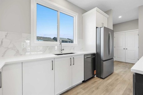 104 Mitchell Walk Nw, Calgary, AB - Indoor Photo Showing Kitchen With Upgraded Kitchen