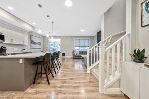 135 Belgian Crescent, Cochrane, AB - Indoor Photo Showing Kitchen With Upgraded Kitchen