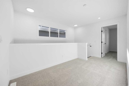 128 Mitchell Walk Nw, Calgary, AB - Indoor Photo Showing Other Room