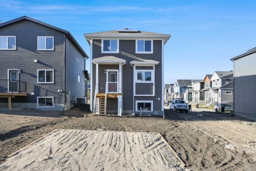 128 Mitchell Walk Nw, Calgary, AB - Outdoor With Facade