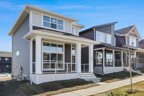 128 Mitchell Walk Nw, Calgary, AB - Outdoor With Facade