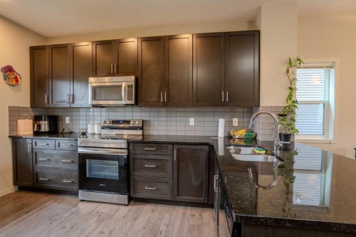4 Copperpond Parade Se, Calgary, AB - Indoor Photo Showing Kitchen