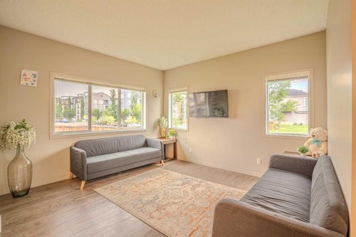 4 Copperpond Parade Se, Calgary, AB - Indoor Photo Showing Living Room