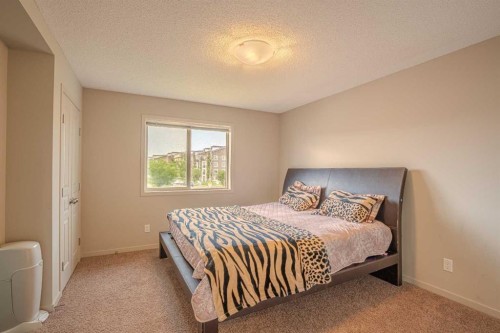4 Copperpond Parade Se, Calgary, AB - Indoor Photo Showing Bedroom