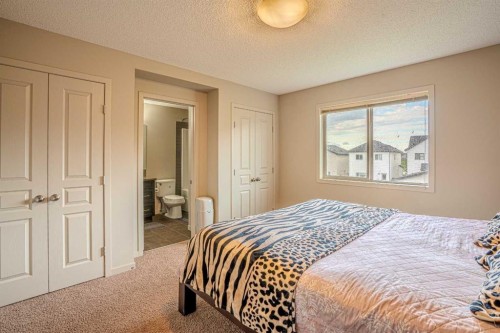 4 Copperpond Parade Se, Calgary, AB - Indoor Photo Showing Bedroom
