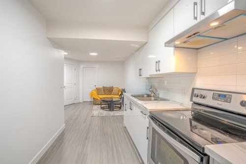 4 Copperpond Parade Se, Calgary, AB - Indoor Photo Showing Kitchen With Double Sink
