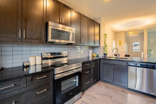 4 Copperpond Parade Se, Calgary, AB - Indoor Photo Showing Kitchen With Upgraded Kitchen