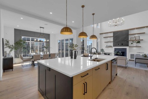 1432 Coopers Landing Sw, Airdrie, AB - Indoor Photo Showing Kitchen With Upgraded Kitchen