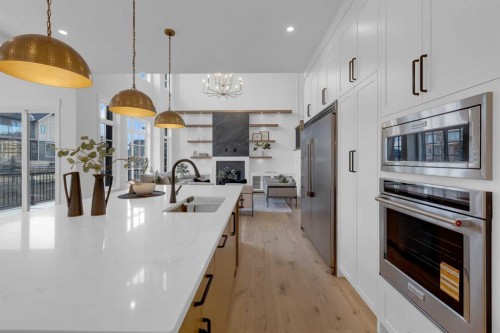 1432 Coopers Landing Sw, Airdrie, AB - Indoor Photo Showing Kitchen With Double Sink With Upgraded Kitchen