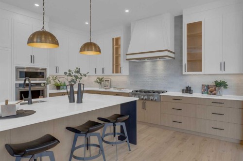 1432 Coopers Landing Sw, Airdrie, AB - Indoor Photo Showing Kitchen With Upgraded Kitchen