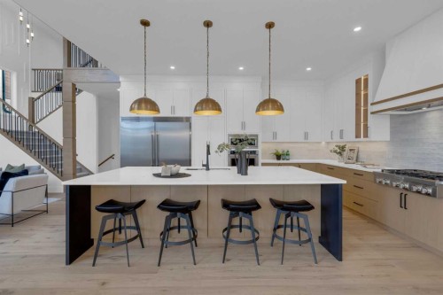 1432 Coopers Landing Sw, Airdrie, AB - Indoor Photo Showing Kitchen With Upgraded Kitchen