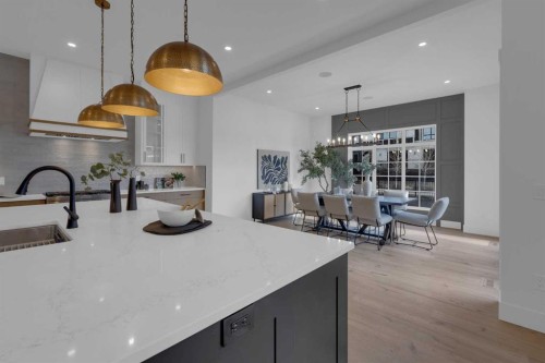 1432 Coopers Landing Sw, Airdrie, AB - Indoor Photo Showing Kitchen With Upgraded Kitchen