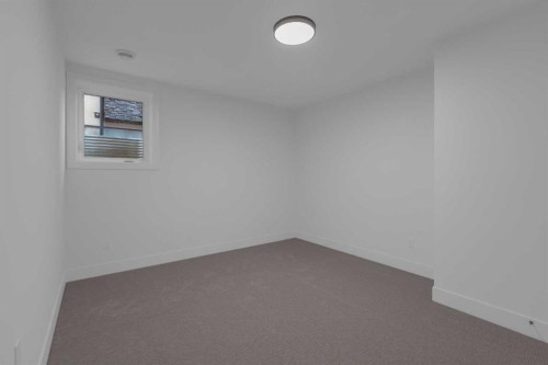 1432 Coopers Landing Sw, Airdrie, AB - Indoor Photo Showing Other Room