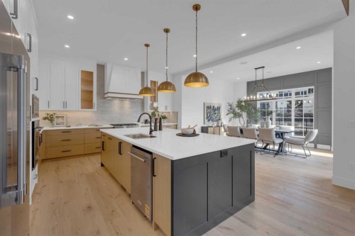 1432 Coopers Landing Sw, Airdrie, AB - Indoor Photo Showing Kitchen With Upgraded Kitchen