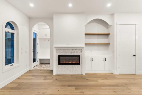 520 34A Street Nw, Calgary, AB - Indoor Photo Showing Other Room With Fireplace