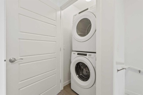 405-301 Redstone Boulevard Ne, Calgary, AB - Indoor Photo Showing Laundry Room