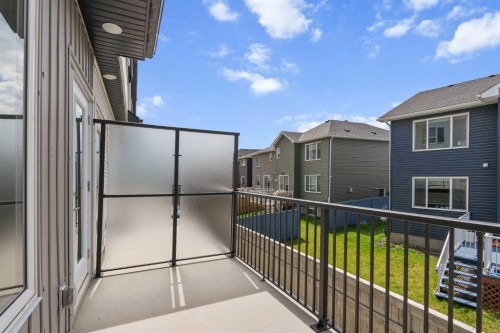 405-301 Redstone Boulevard Ne, Calgary, AB - Outdoor With Balcony With Exterior