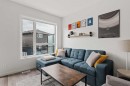 405-301 Redstone Boulevard Ne, Calgary, AB  - Indoor Photo Showing Living Room 