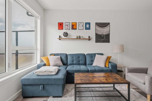 405-301 Redstone Boulevard Ne, Calgary, AB - Indoor Photo Showing Living Room