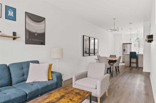 405-301 Redstone Boulevard Ne, Calgary, AB - Indoor Photo Showing Living Room