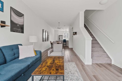 405-301 Redstone Boulevard Ne, Calgary, AB - Indoor Photo Showing Living Room