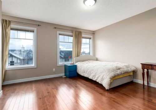 12 Royal Oak Lane Nw, Calgary, AB - Indoor Photo Showing Bedroom