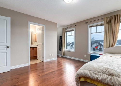 12 Royal Oak Lane Nw, Calgary, AB - Indoor Photo Showing Bedroom