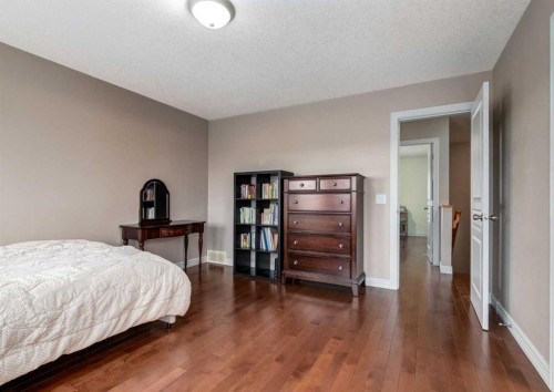 12 Royal Oak Lane Nw, Calgary, AB - Indoor Photo Showing Bedroom
