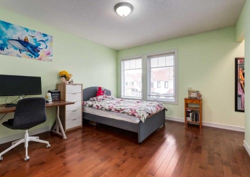 12 Royal Oak Lane Nw, Calgary, AB - Indoor Photo Showing Bedroom