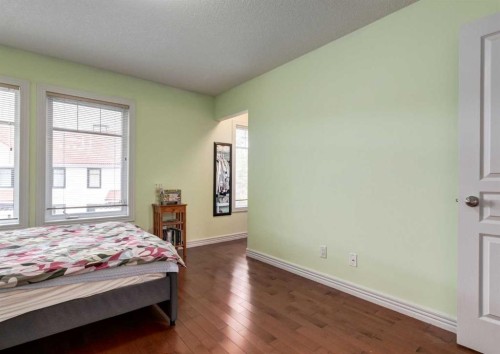 12 Royal Oak Lane Nw, Calgary, AB - Indoor Photo Showing Bedroom