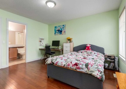 12 Royal Oak Lane Nw, Calgary, AB - Indoor Photo Showing Bedroom