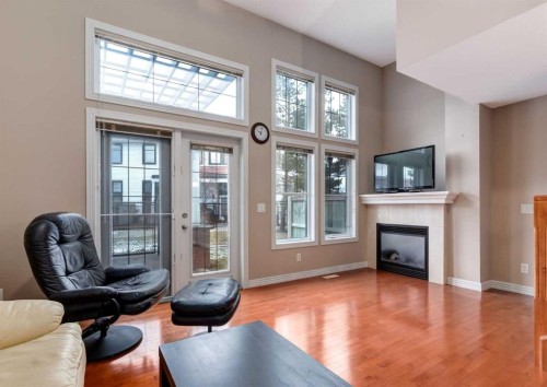 12 Royal Oak Lane Nw, Calgary, AB - Indoor Photo Showing Living Room With Fireplace