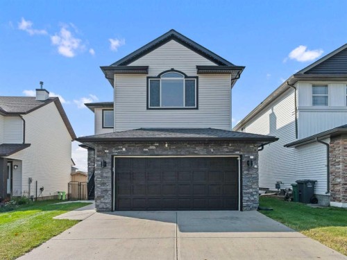 95 Crystal Shores Road  Okotoks, AB T1S 2H9