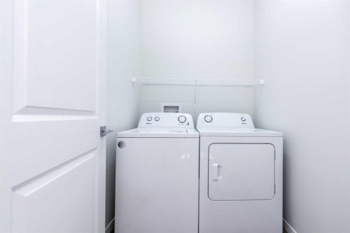 57 Corner Glen Row Ne, Calgary, AB - Indoor Photo Showing Laundry Room